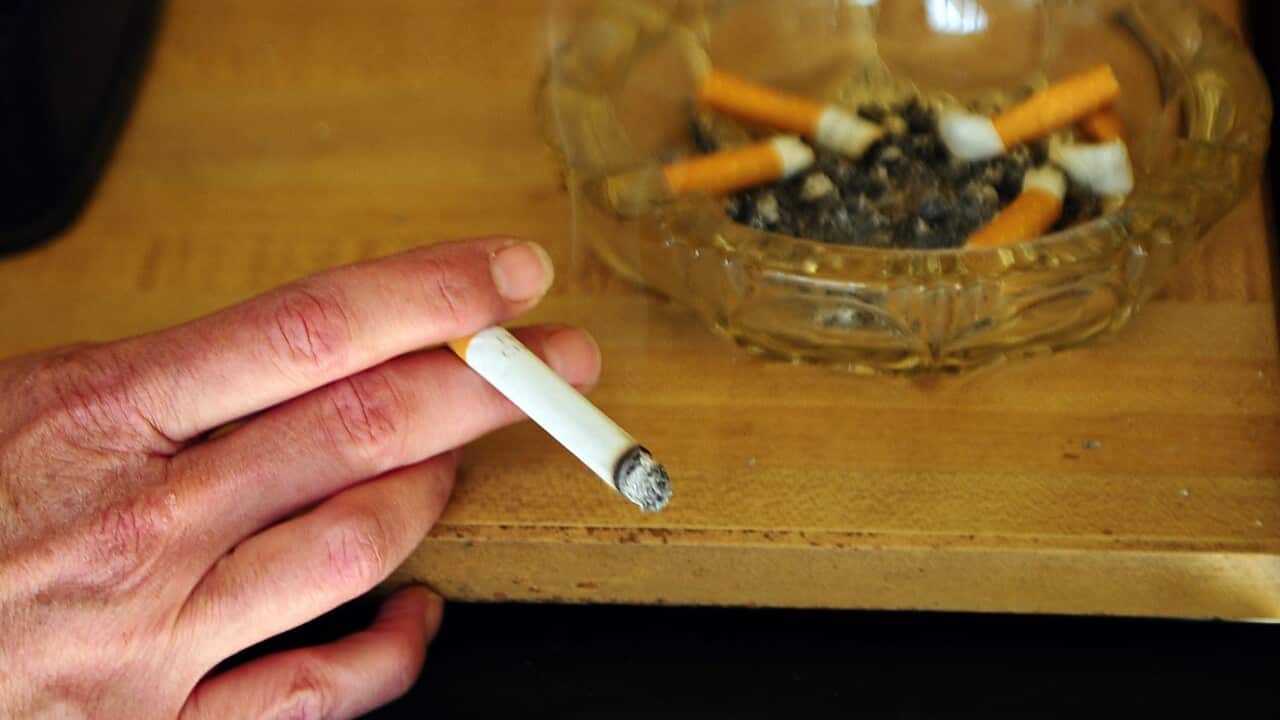 Cigarette and ashtray