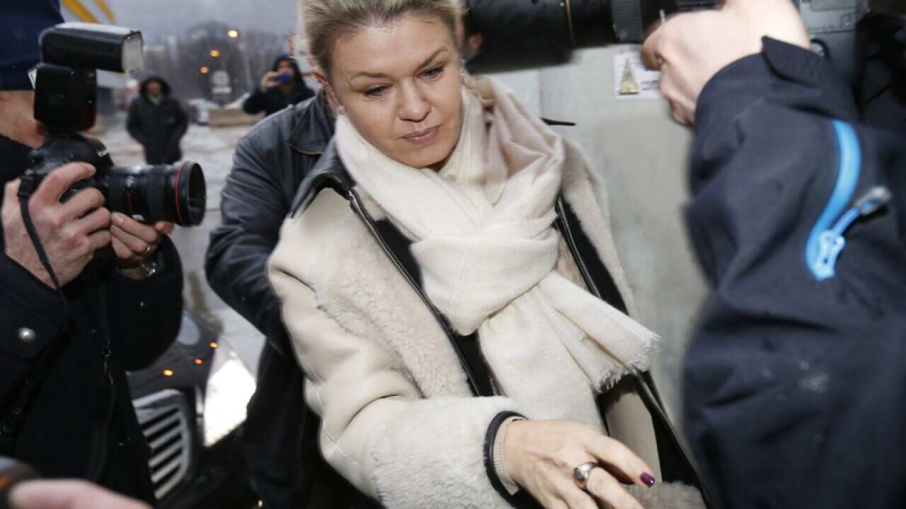 Corinna Schumacher arriving at a hospital