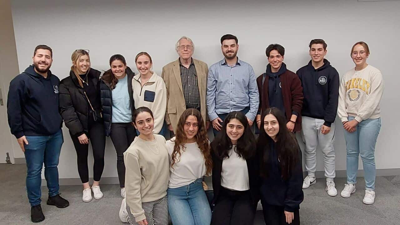 UTS 1 Group shot of Dr Alfred Vincent with students following his talk in August.jpg