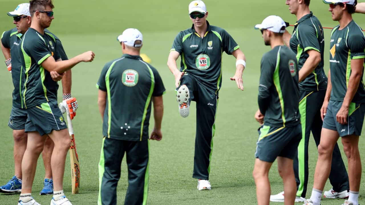 Australian cricket captain Steven Smith warms up at the Gabba