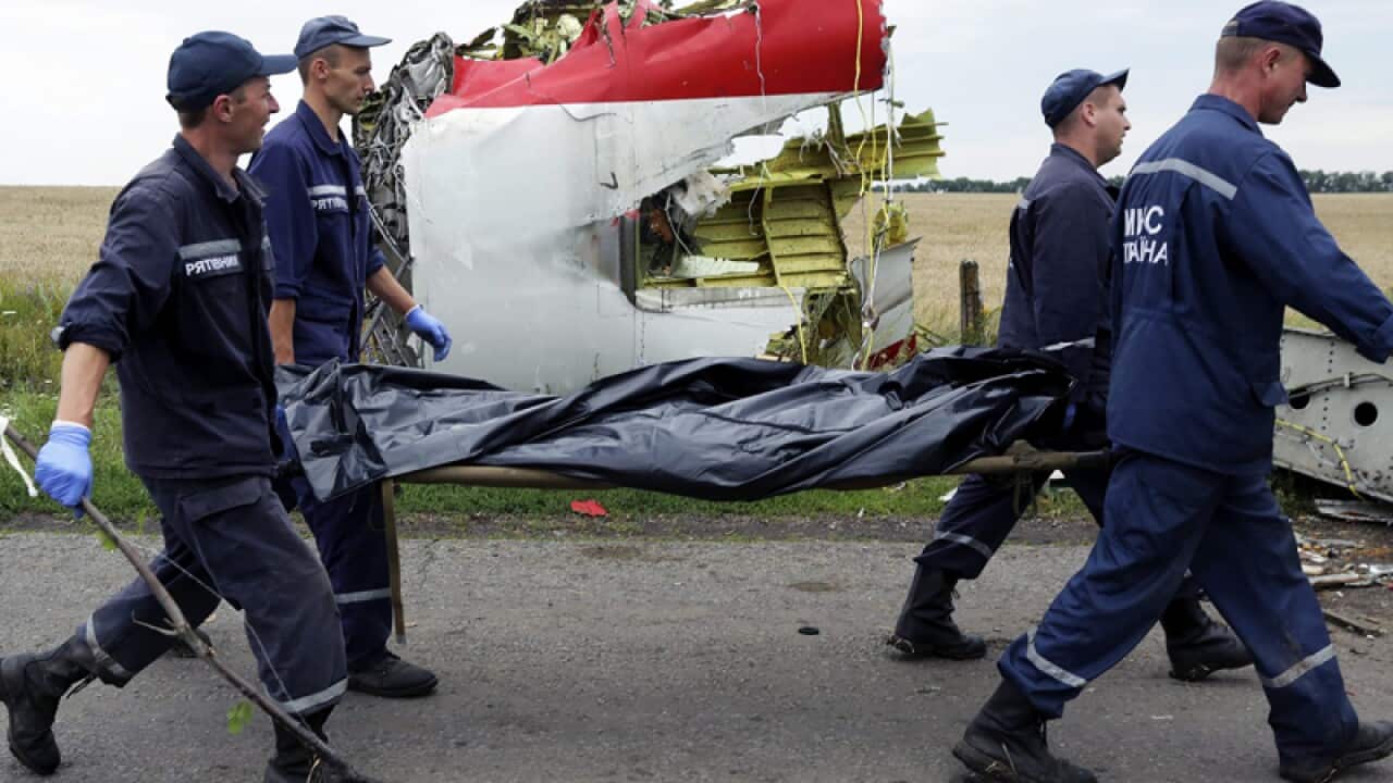 Rescue forces at the MH17 crash site