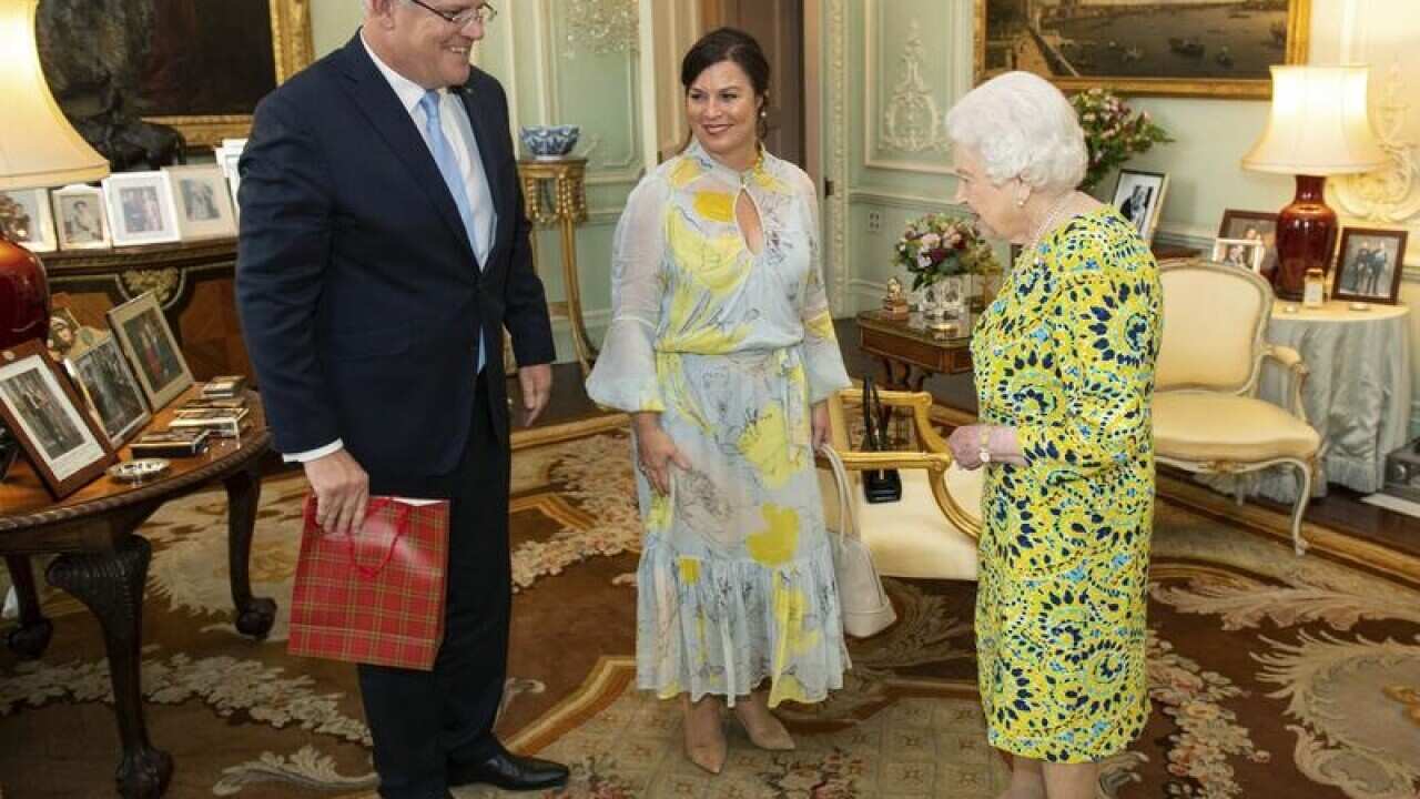 Queen Elizabeth (R) meets PM Scott Morrison and his wife Jenny