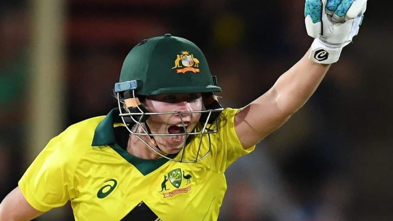 Australia's Beth Mooney celebrates their win over England