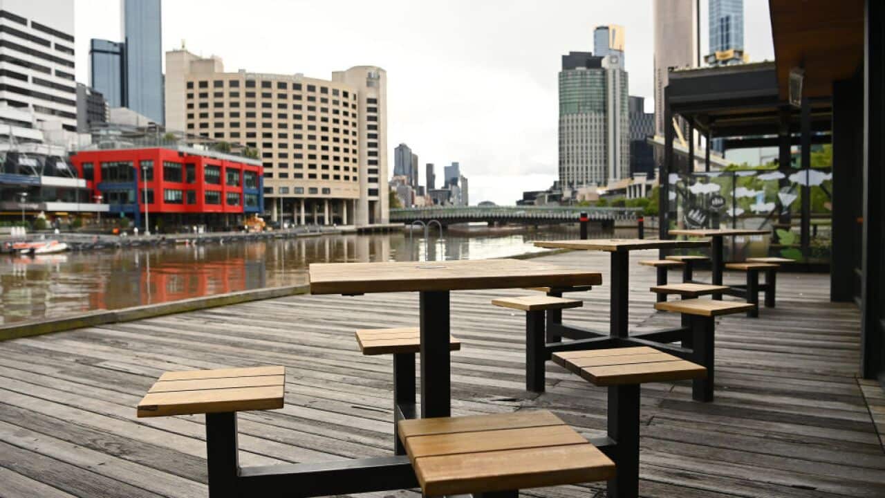 Empty outside dining tables in South Wharf are seen on 17 October, 2021 in Melbourne. 