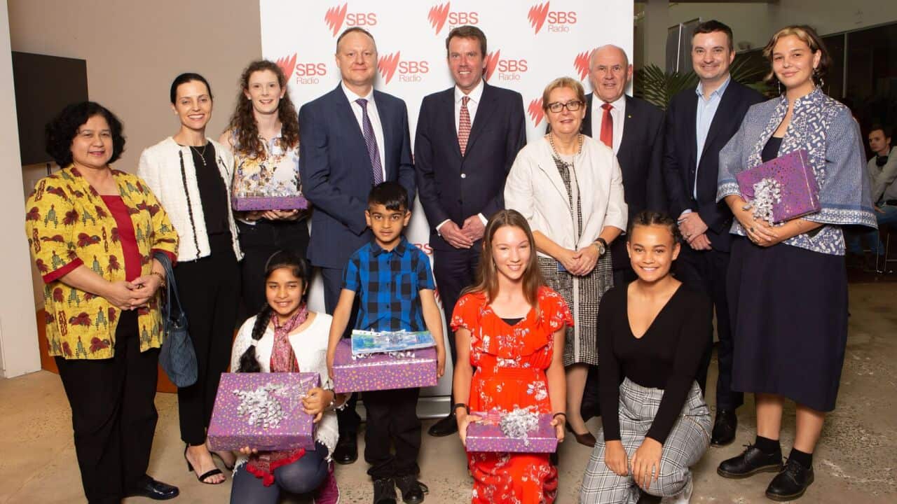 The competition winners with the judges, SBS managing director James Taylor and Education Minister Dan Tehan.