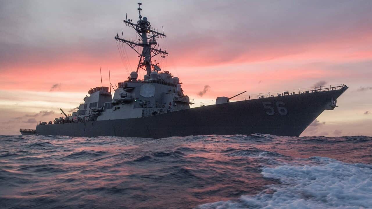 USS John S. McCain conducts a patrol in the South China Sea.