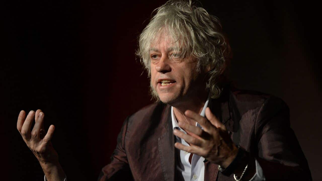 ock singer and poverty activist Bob Geldof gestures as he addresses the 2014 AIDS Conference in Melbourne on July 24, 2014.