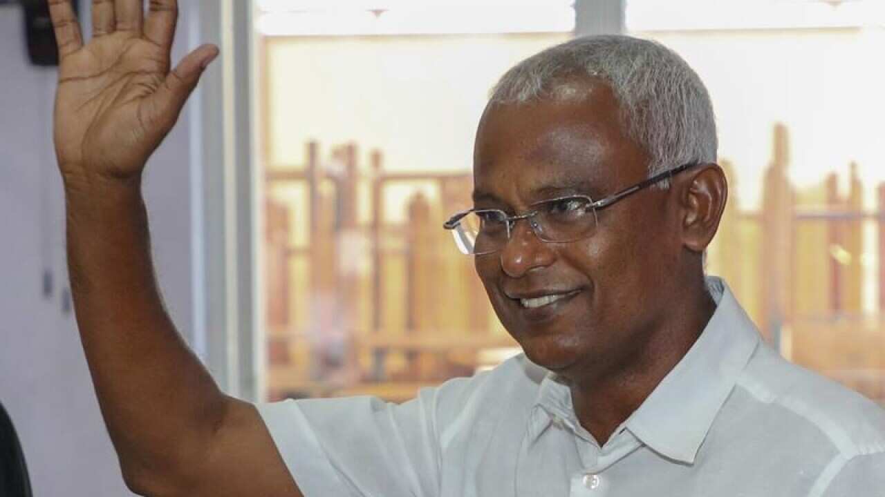 Ibrahim Mohamed Solih casting his vote during the election