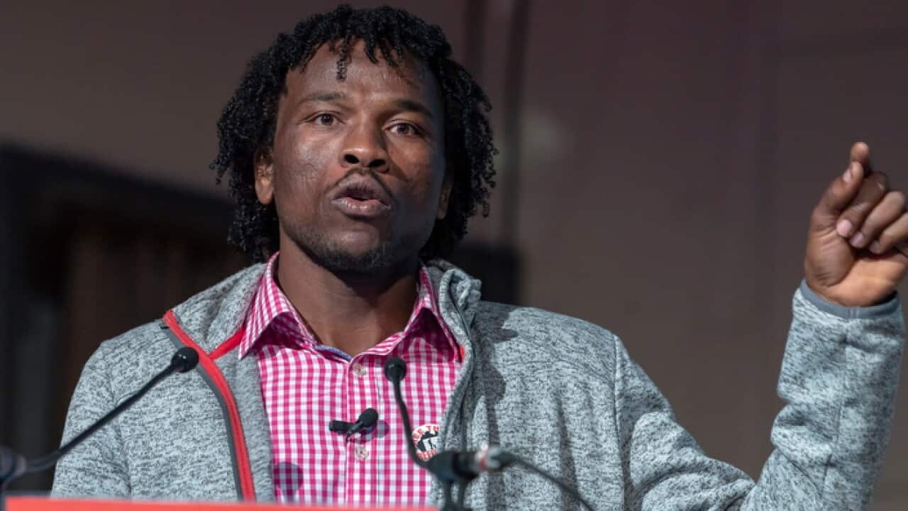 Prize winner, Abdul Aziz Muhama, speaks during the annual ceremony of the Martin Ennals Award in Geneva