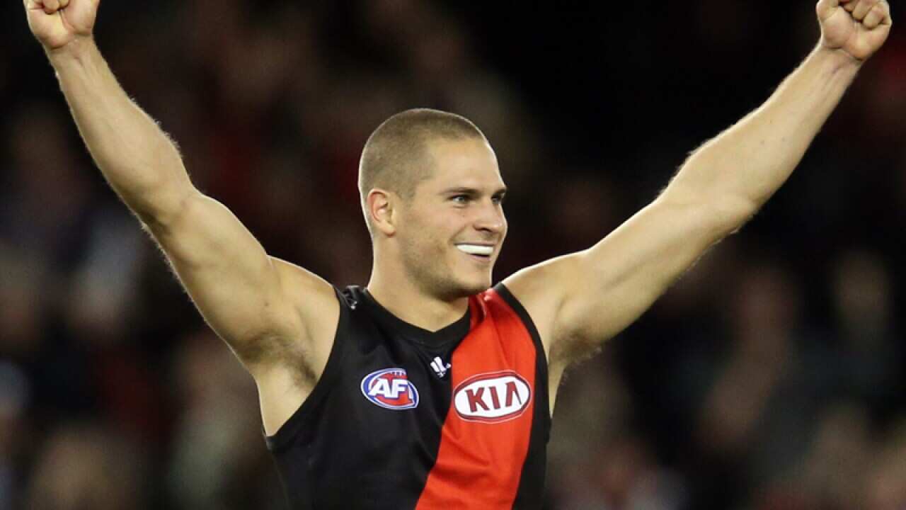 Essendon's David Zaharakis reacts during a game