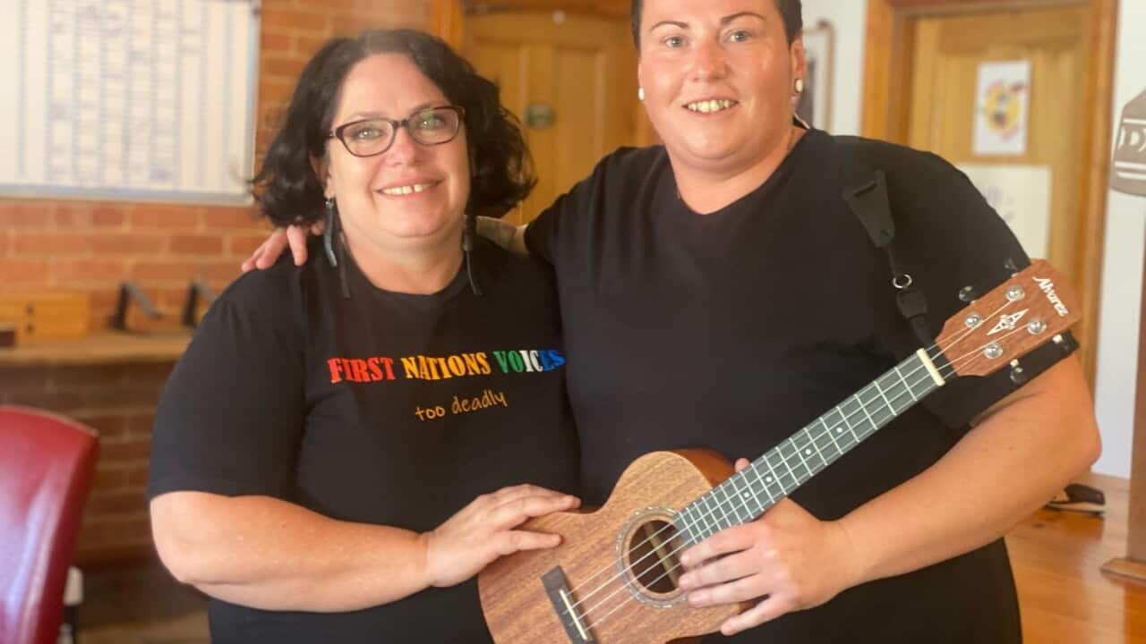 Songs Inside facilitator Nancy Bates stands next to program participant Fabiann Brochelle.jpg