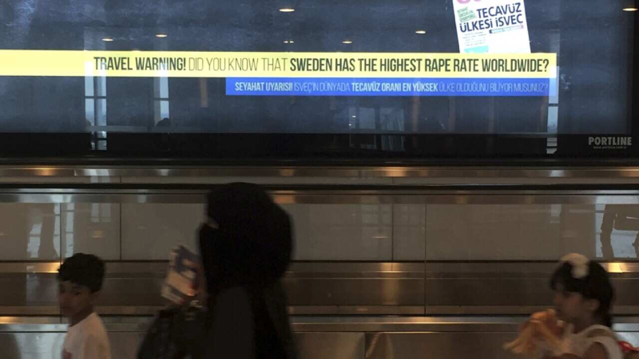 A billboard warns against travel to Sweden at Turkey's airport
