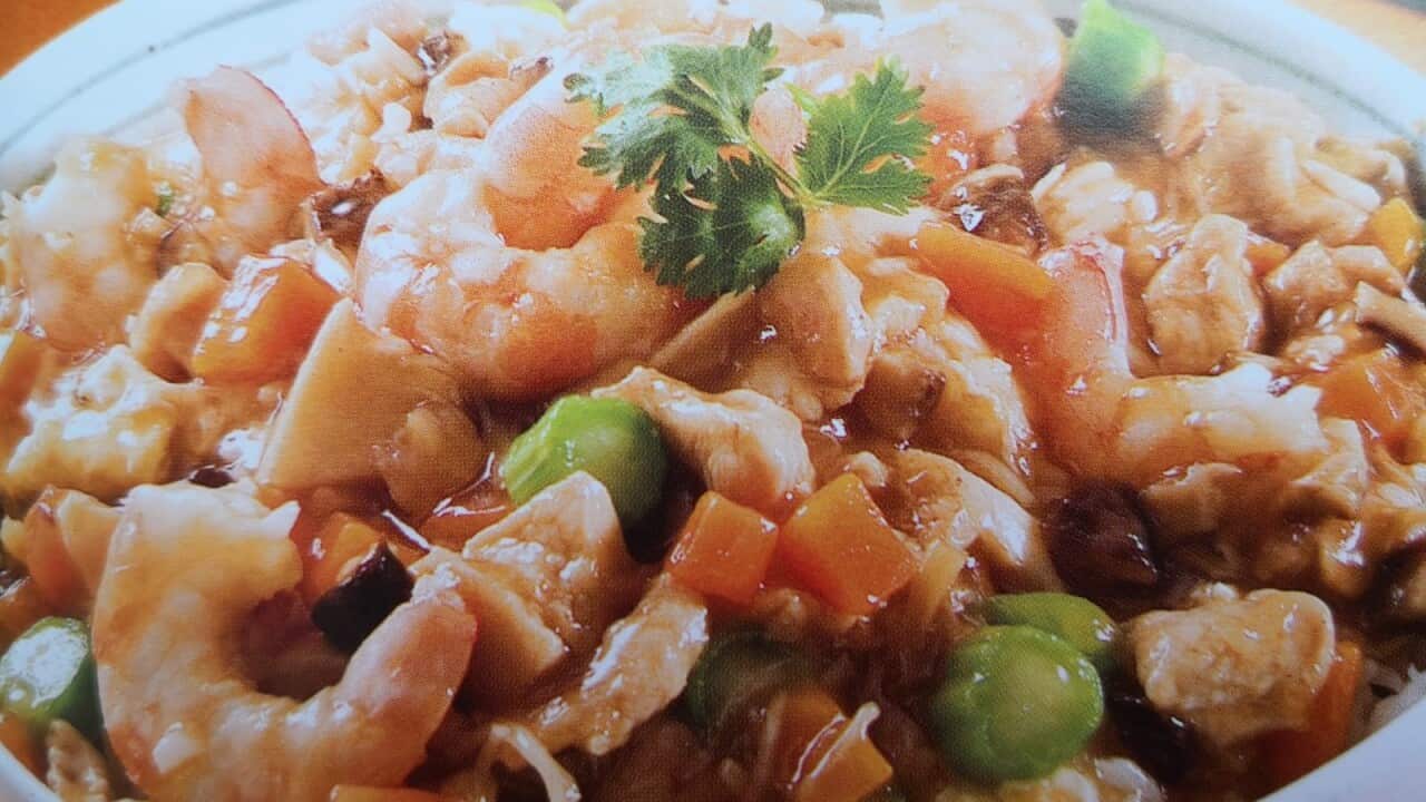 濃濃的汁配以海鮮做出的一味不一般的炒飯。