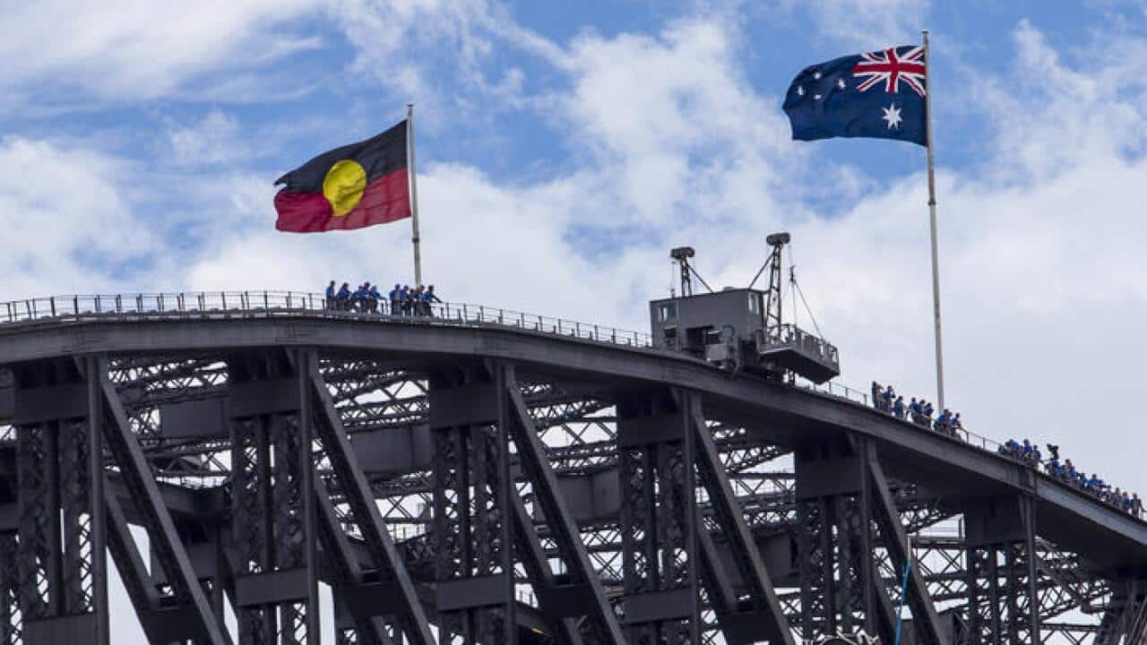 The Australian and the Aboriginal flag together on the Sydney Harbour bridge for the first time ever, Australia Day, Sydney, Saturday, Jan. 26, 2013