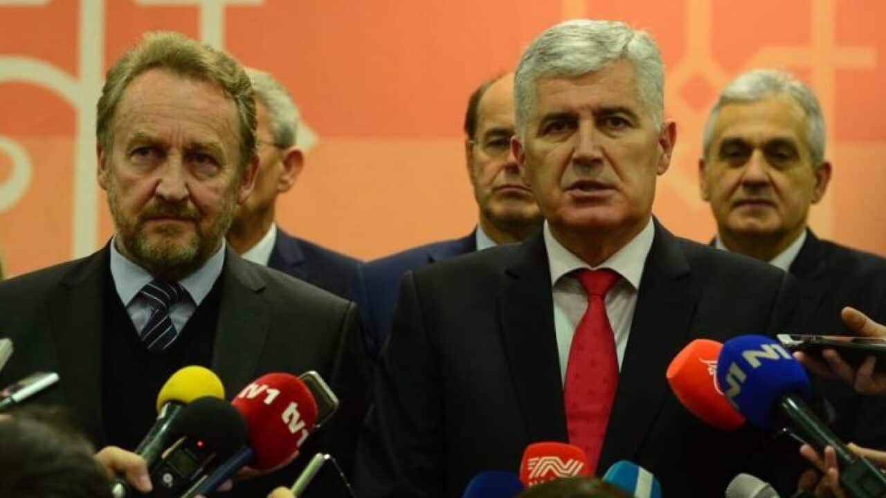Bosnian political leaders - Bakir Izetbegovic and Dragan Covic