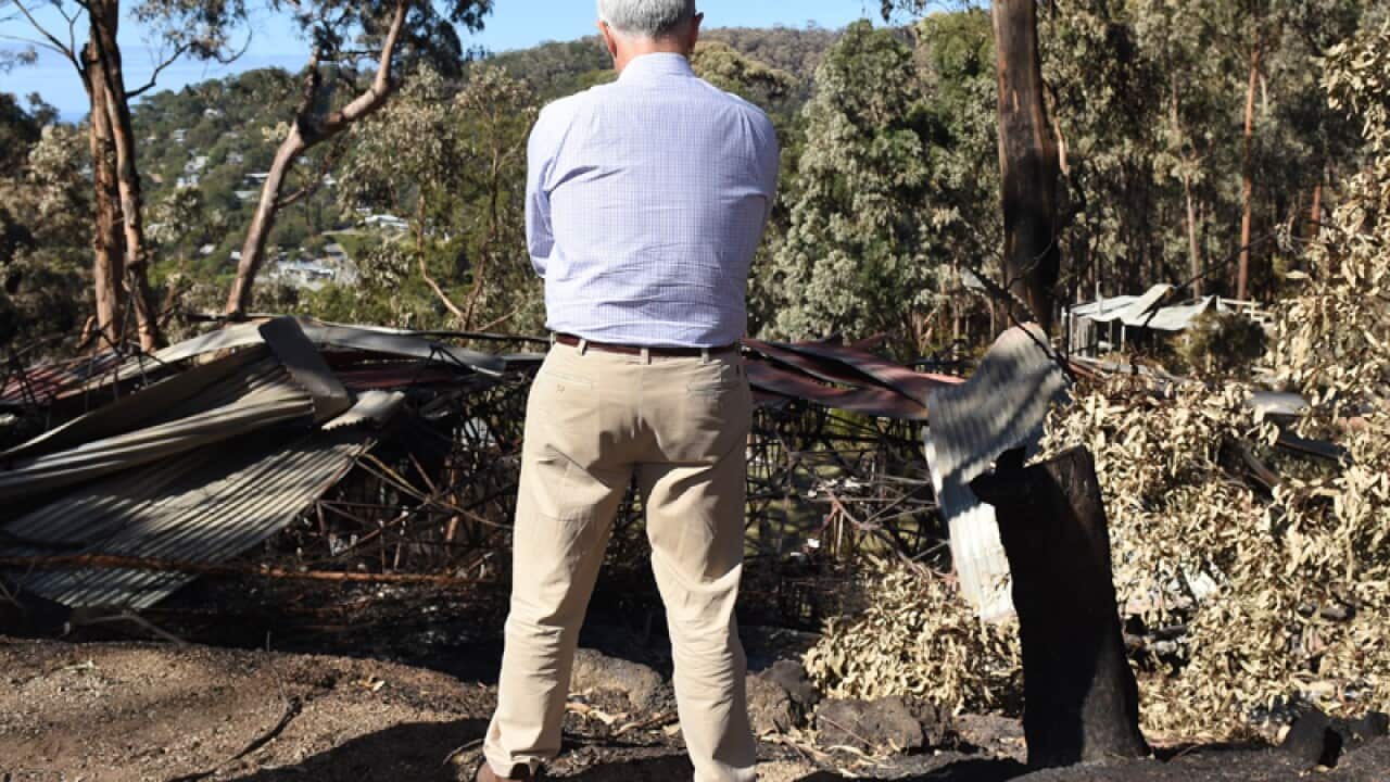 Malcolm Turnbull at the site of a bushfire in Wye River, Victoria