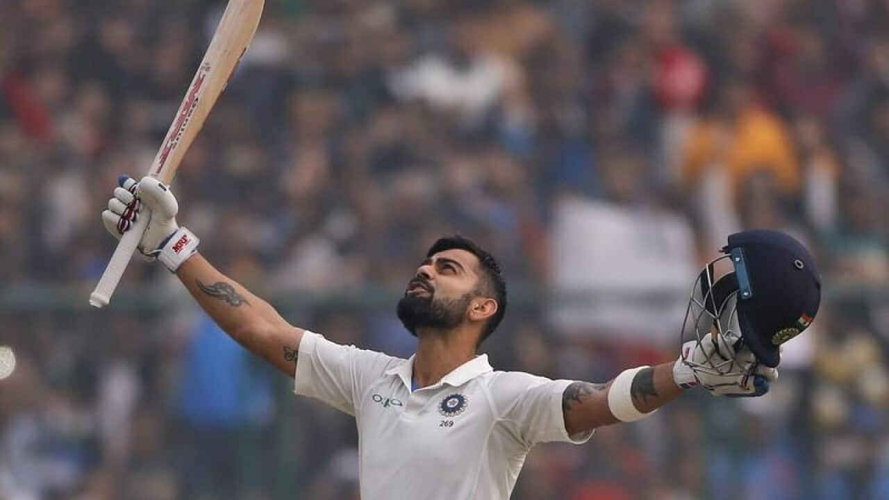 India's captain Virat Kohli celebrates after scoring a double century.