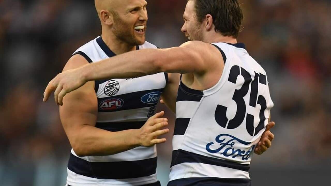 Gary Ablett and Patrick Dangerfield embrace