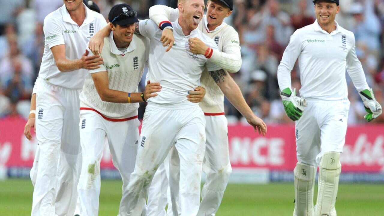 England’s Ben Stokes (C) celebrates with teammates