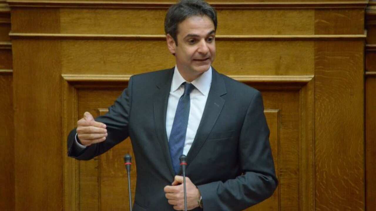 Mp with New Democracy Kyriakos Mitsotakis talks to the