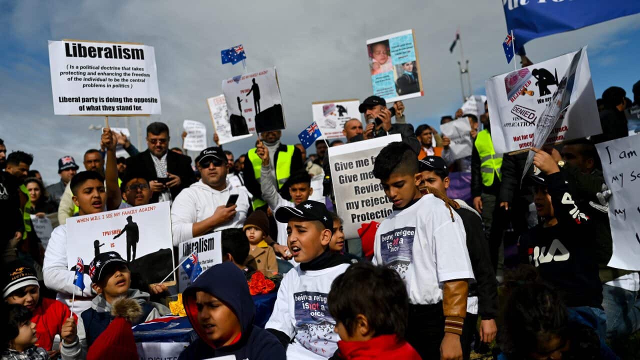 Children are seen attending a rally by Temporary Protection Visa (TPV) and Safe Haven Enterprise Visa (SHEV) holders outside Parliament House in Canberra, Monday, 29 July, 2019. (AAP Image/Lukas Coch) NO ARCHIVING