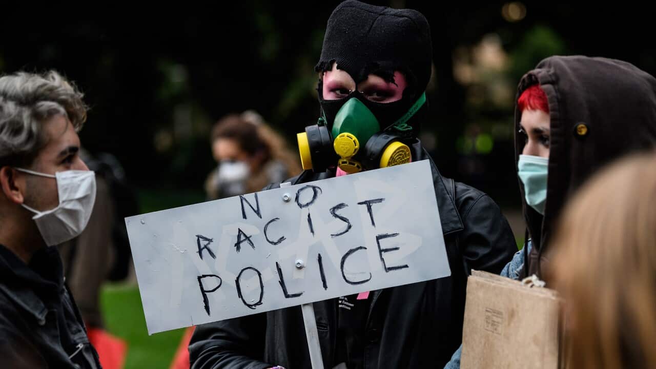 Protesters gather during a Black Lives Matter protest, following the death in Minneapolis police custody of George Floyd, in Sydney, Tuesday, June 2, 2020. (AAP Image/James Gourley) NO ARCHIVING