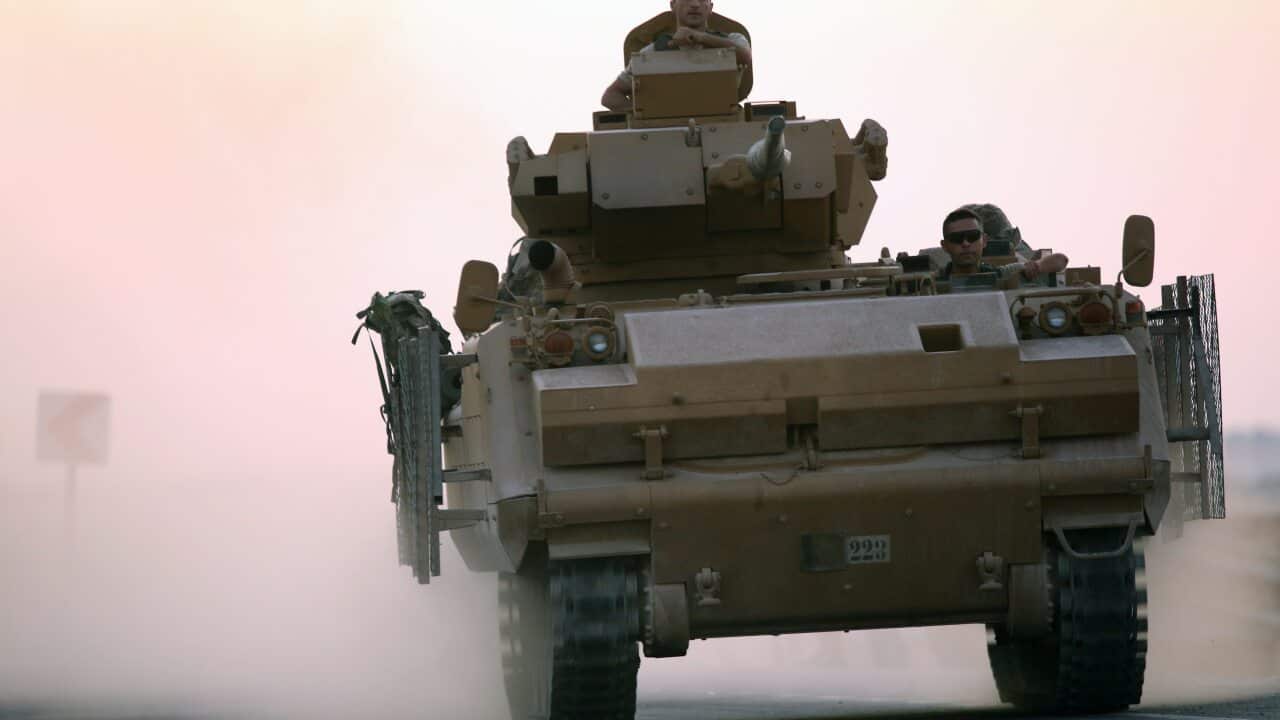Turkish armoured elements advance on Kurdish positions in northern Syria.