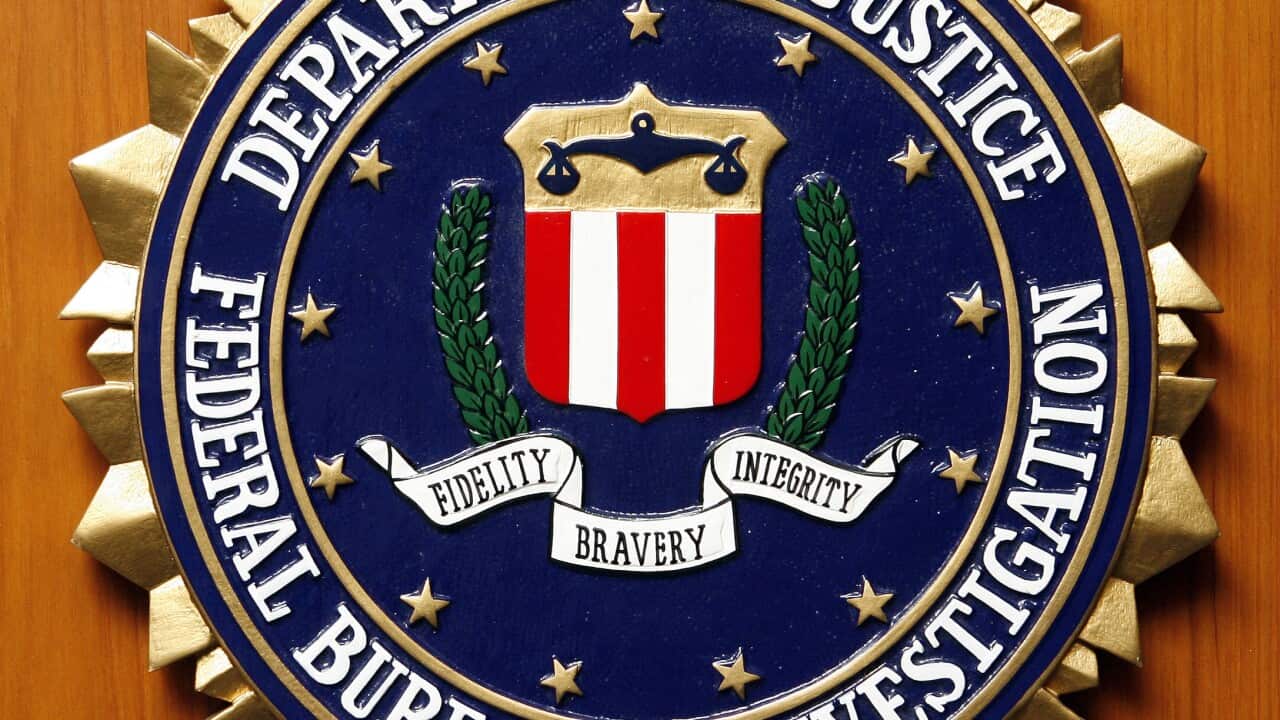 Logo of the Federal Bureau of Investigation of the Department of Justice of the United States of America pictured at the embassy of the USA in Berlin, Germany, Friday, Aug. 10, 2007. (AP Photo/Michael Sohn)