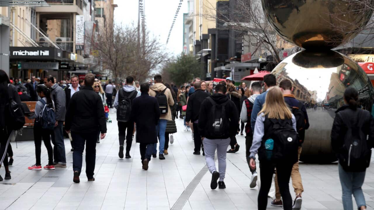 Immigrants in city street