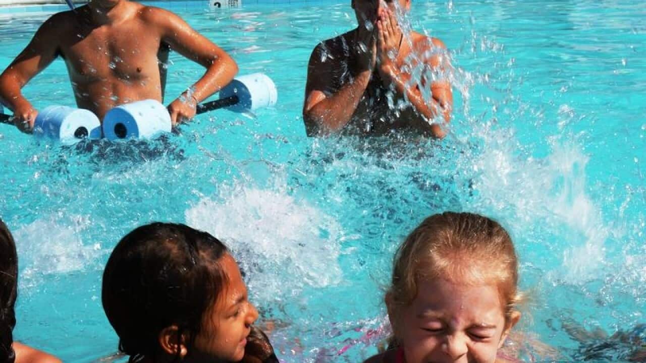 Kids participating in pool time.