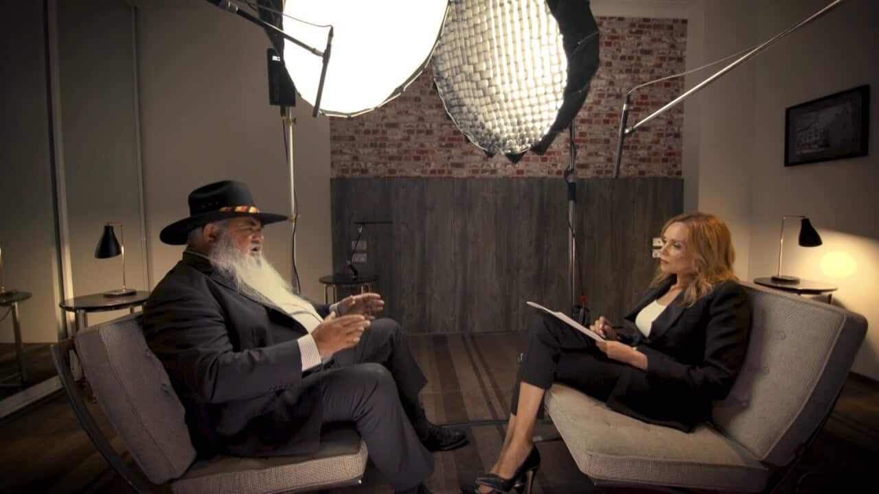 Senator Pat Dodson and NITV presenter Karla Grant sitting on couches in conversation