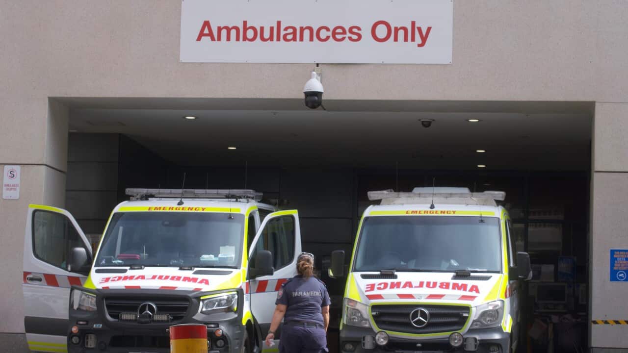 Two ambulances outside a hospital