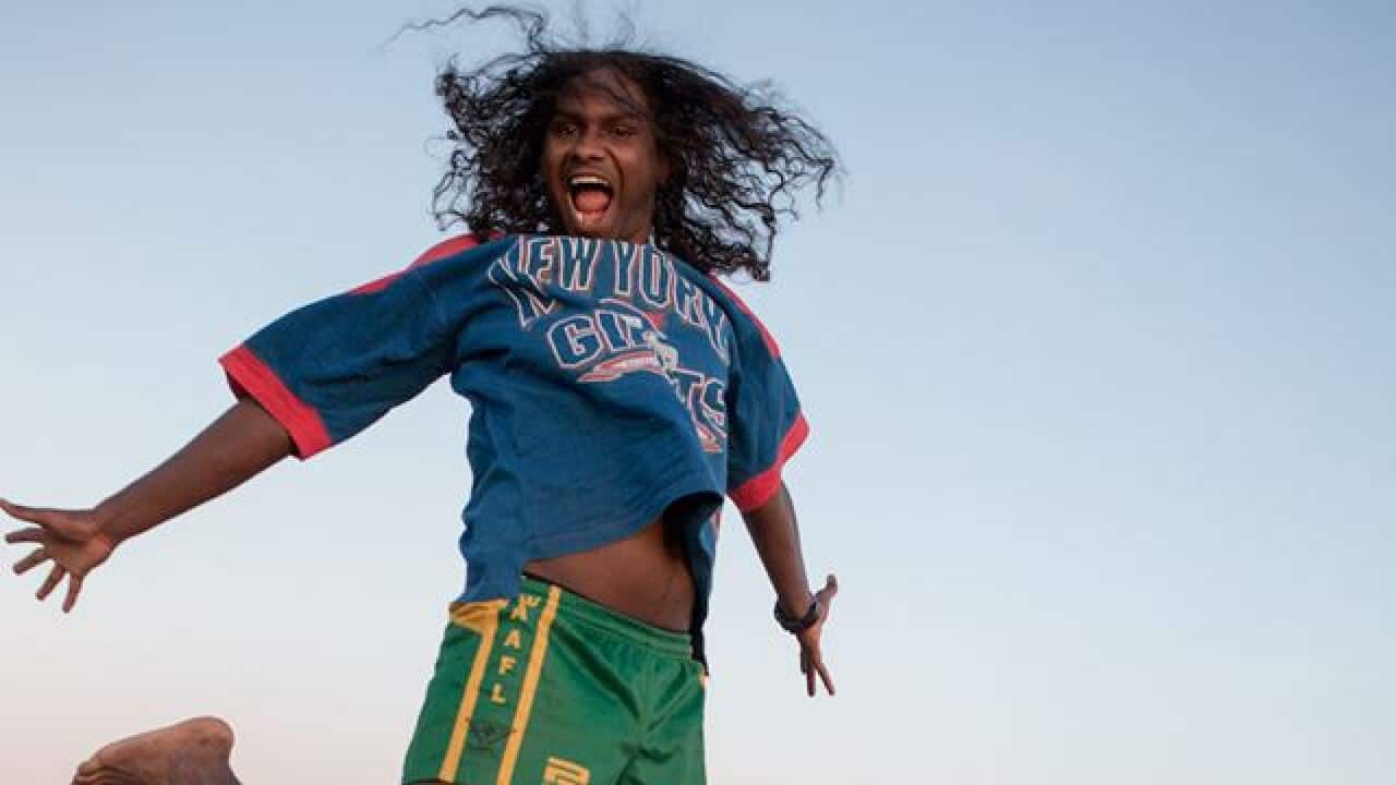 Baker Boy raps in a mix of English and Yolngu Matha.