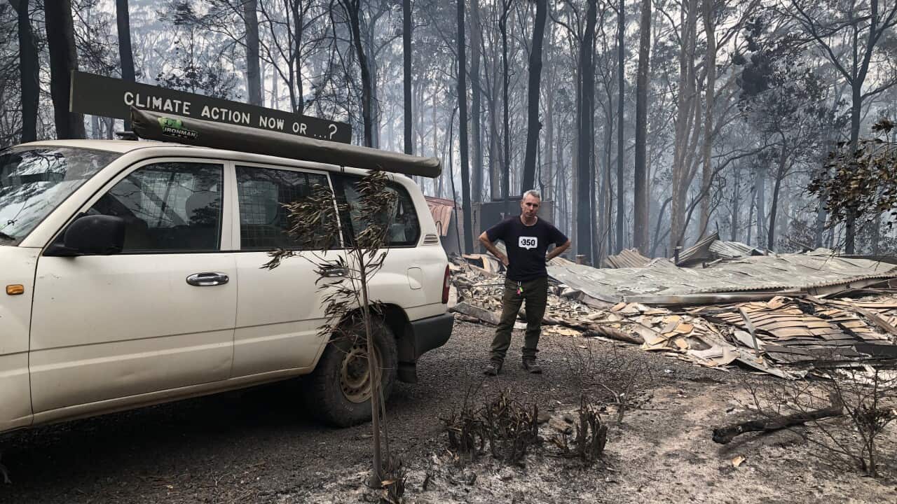 Jack Egan amid the remains of his property