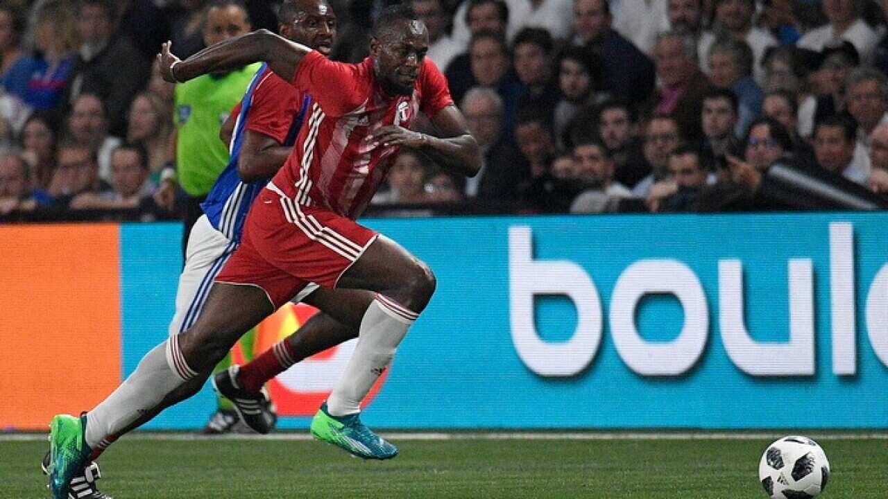 Jamaican athlete Usain Bolt plays in a friendly between French 1998 World Champion soccer players and an international selection in June 2018