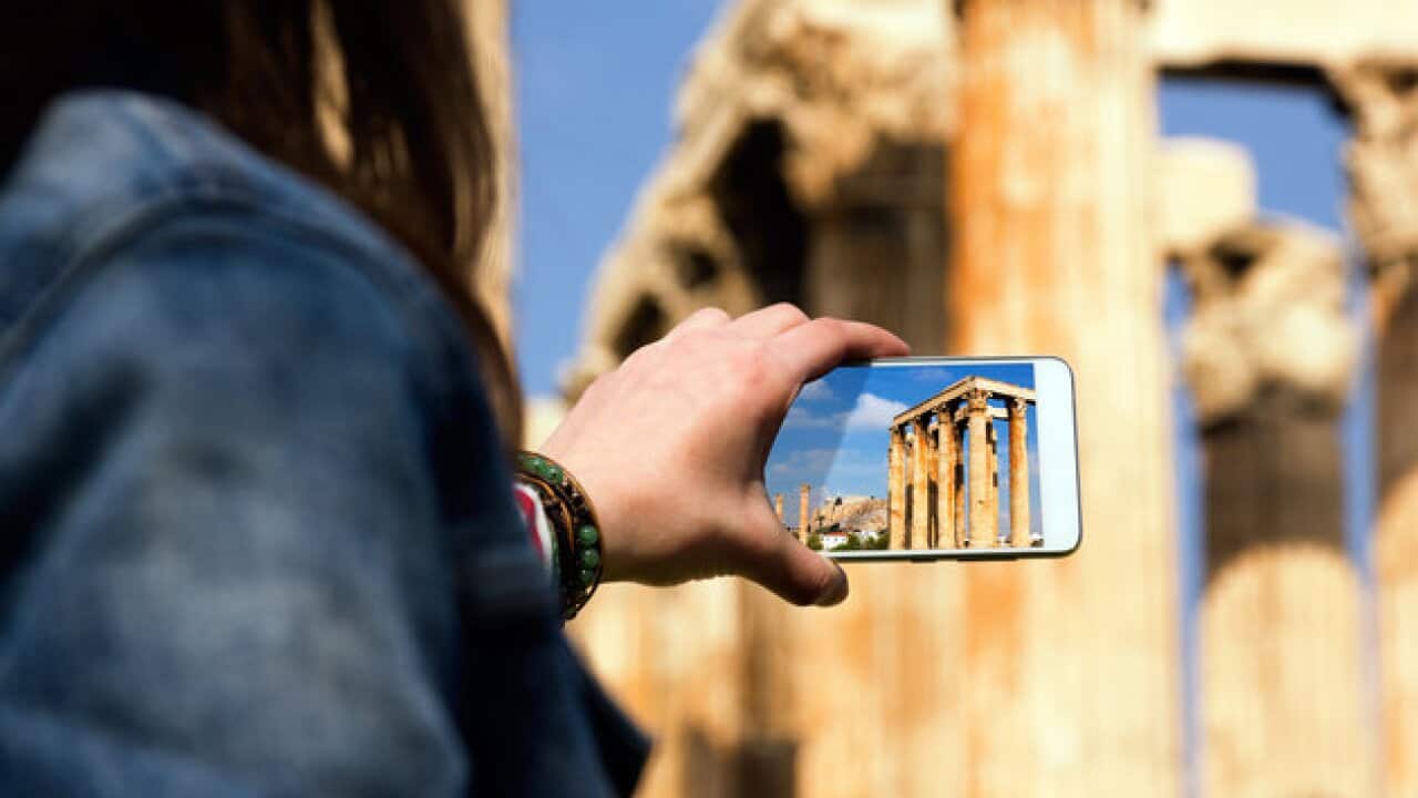 Travel concept - tourist snapshot of the Temple of Olympian Zeus, Athens, Greece.