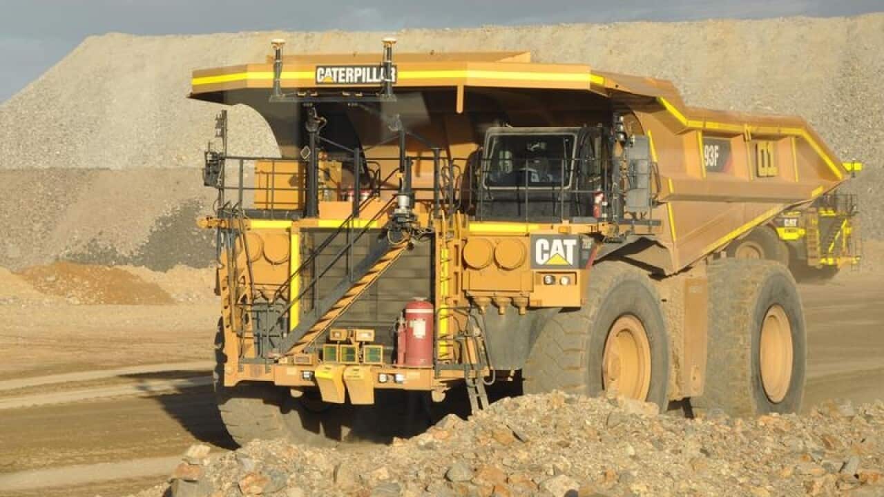 A supplied image of a Rio Tinto CAT autonomous truck.