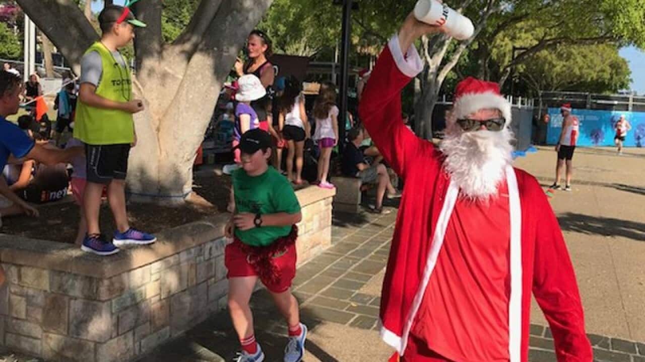 ParkRun participant Tim Appleton cools off after a 5km run.