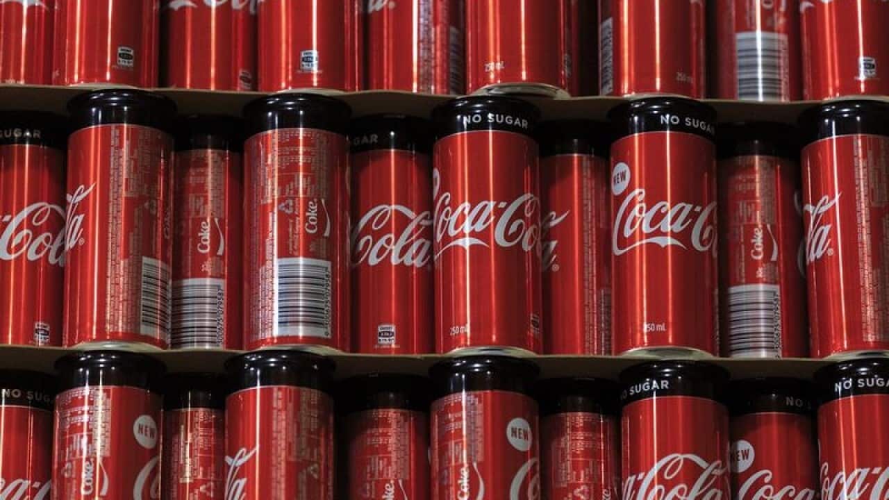 Cans of Coca-Cola