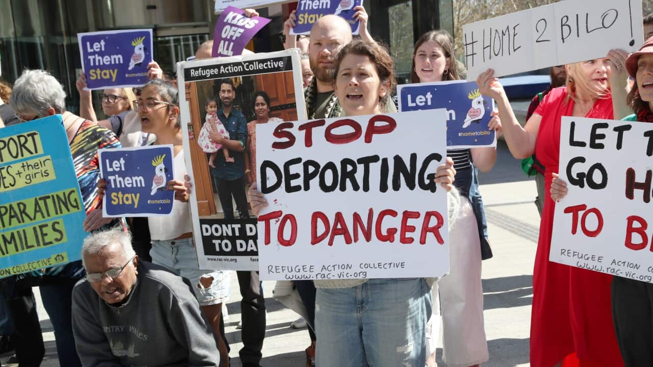 Supporters wait for a judgment in September on whether a Tamil family from Biloela will be deported to Sri Lanka