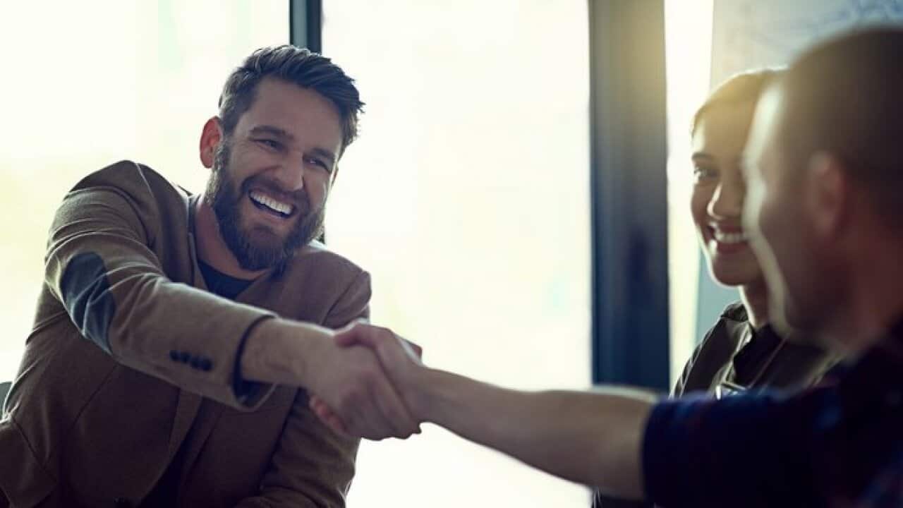 Handschlag mit Freundlichkeit