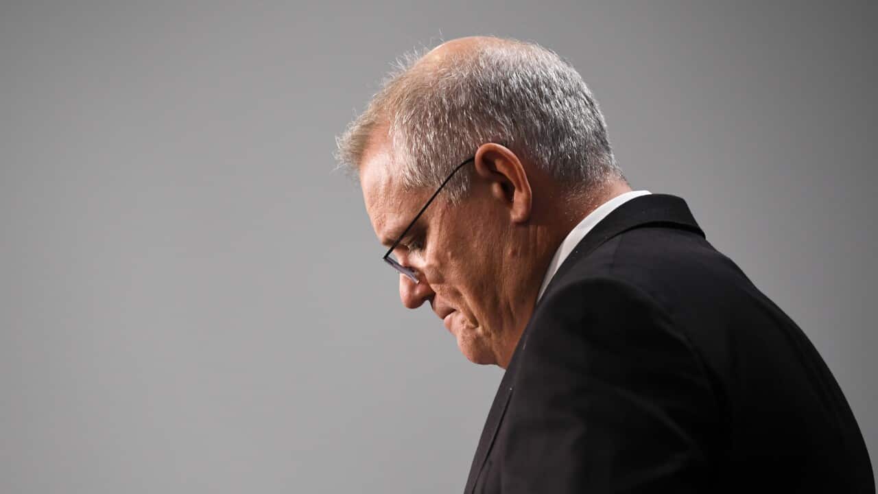 Prime Minister Scott Morrison reacts during a press conference at Parliament House.