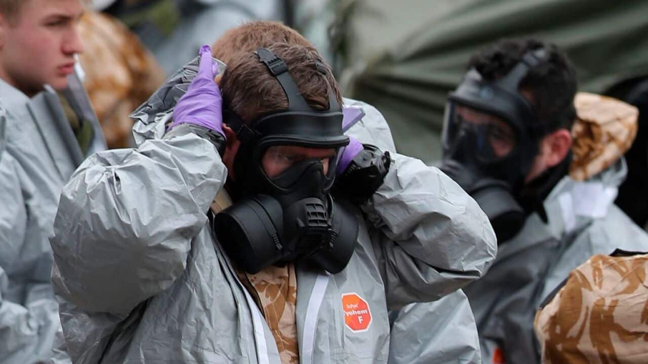 British soldiers don their hazmat suits. Salisbury, England. March 11, 2018.