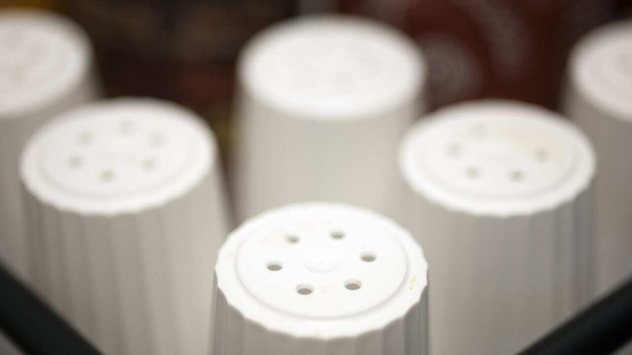 File photo shows salt shakers at a restaurant. (AP Photo/Cliff Owen, File)