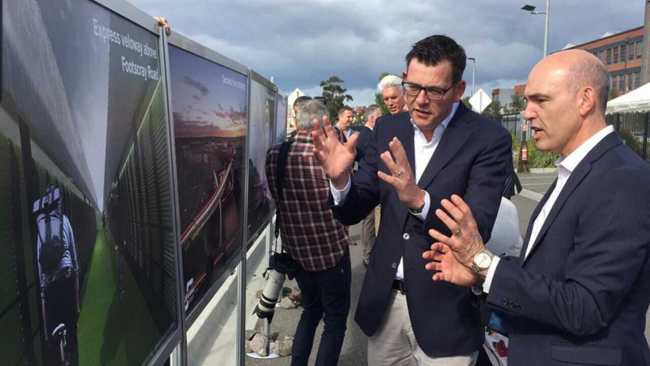 Victorian Premier Daniel Andrews (C)