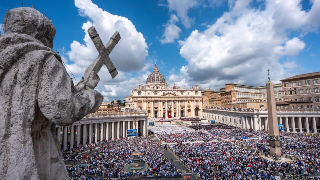 The new Pope Leo XIV stands in St. Peter's Square at his inauguration.