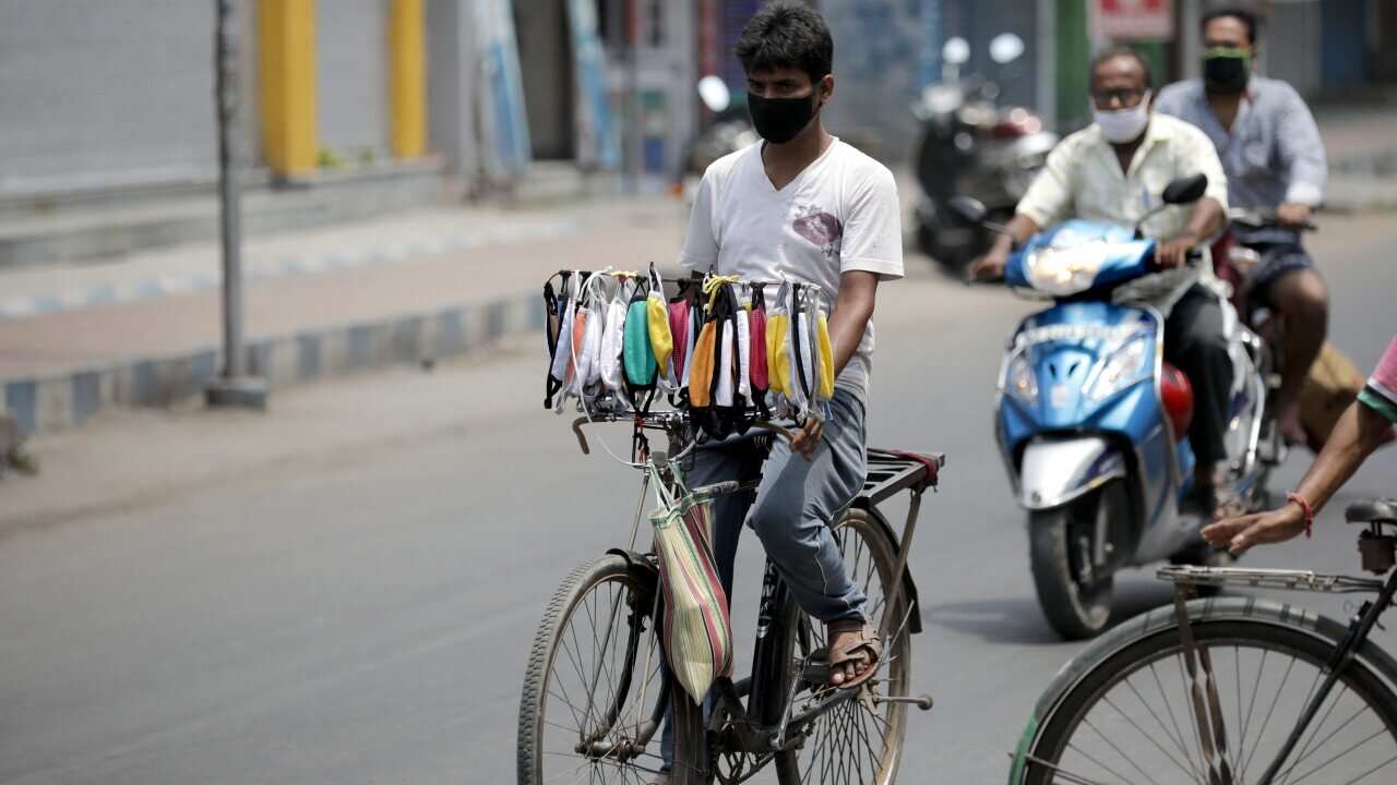 A man sells face masks during the lockdown in Kolkata, India.