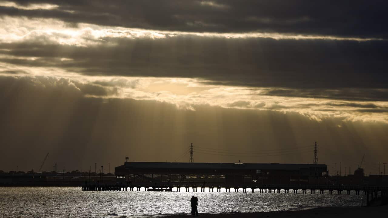 A view of the sunset over Port Melbourne Beach.