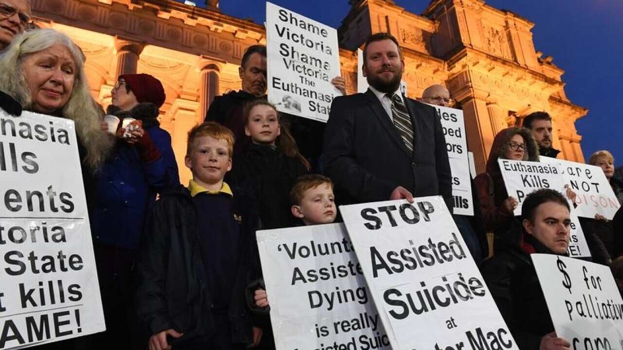 Pro life demonstrators outside the Victorian parliament.