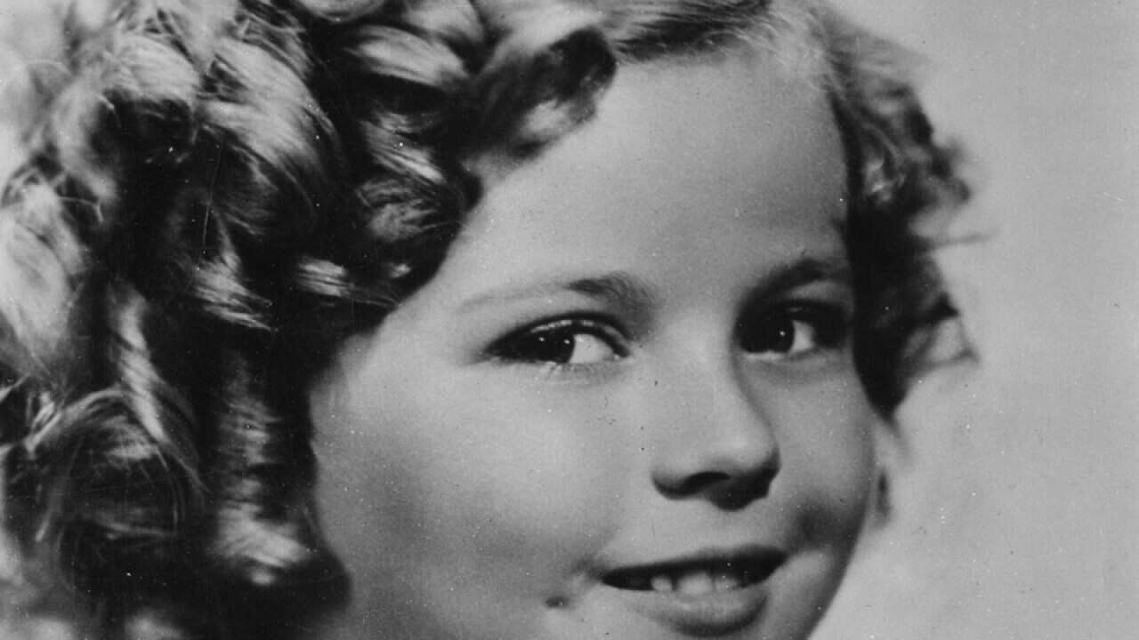 8-year-old U.S. American child movie star Shirley Temple.